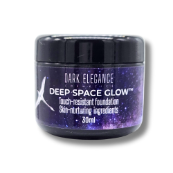 Foundation jar, sleek, black in colour with a bright cosmic nebula style label. It says Deep Space Glow Touch-resistant, Skin-nurturing foundation