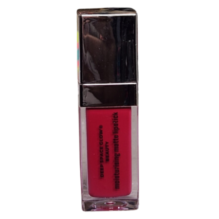 The image shows a tube of lipstick with a shiny silver cap and a clear base. The lipstick is a bold and bright red shade. The text on the bottle reads, “DEEP SPACE GLOW® BEAUTY moisturizing matte lipstick.” The design is sleek and modern, with a vibrant color inside.