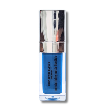 The image shows a tube of lipstick with a silver metallic cap and a transparent base. The lipstick is a vibrant blue shade, and the text on the bottle reads, “DEEP SPACE GLOW® BEAUTY moisturizing matte lipstick.” The overall design is sleek and modern.